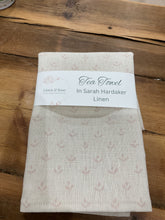 Load image into Gallery viewer, Tea Towel - Sarah Hardaker - Coco Pale pink on cream linen
