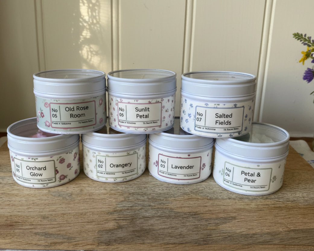 Hand poured tin candle with wax floral finishing - Orchard Glow