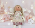 Mrs Ditsy floral top Angel - pretty sitting angel